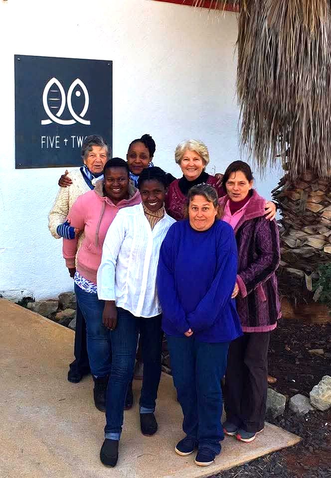 The Five Plus Two Ministries team outside Zoé House